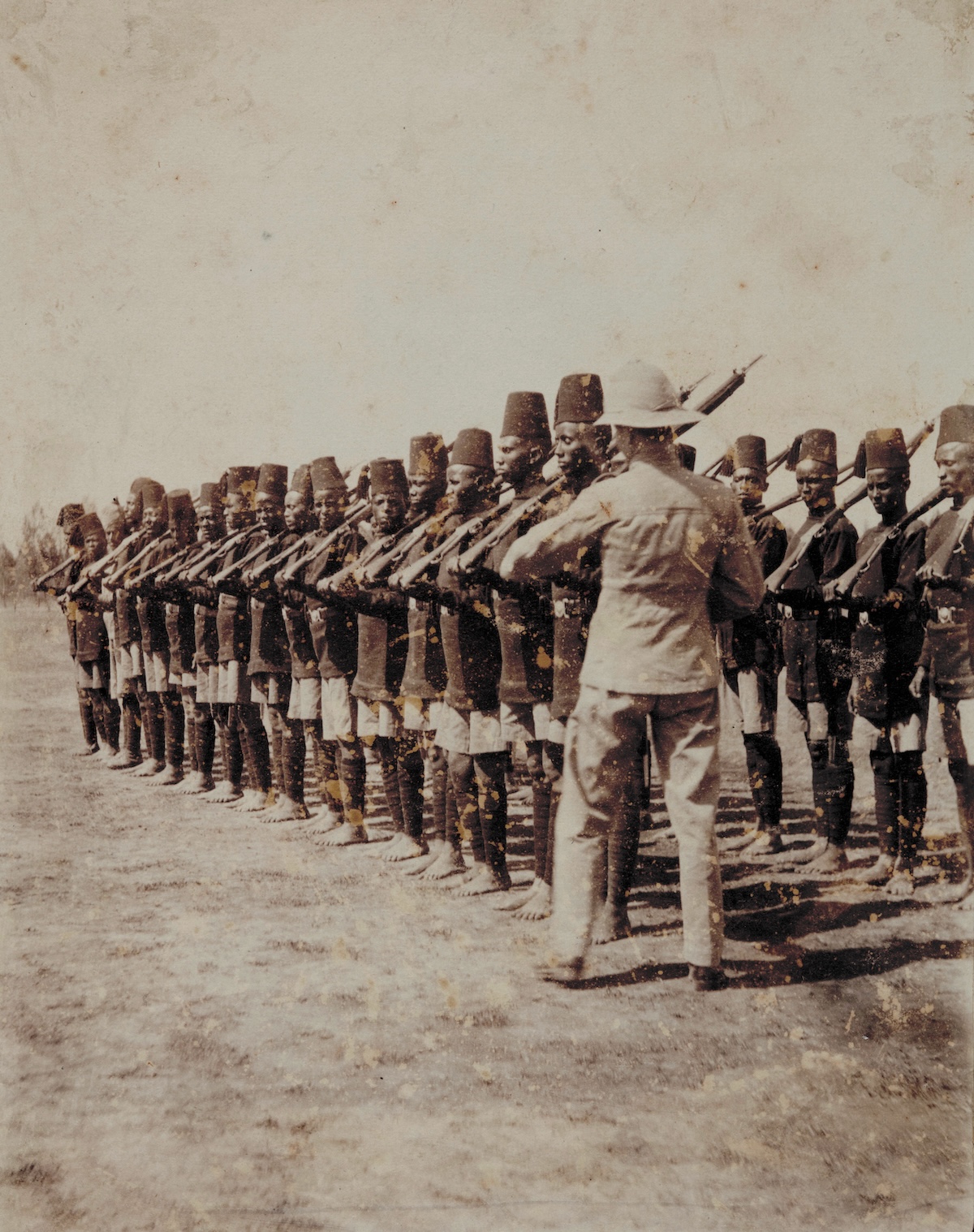 Somali recruits enlisted at Kismayu, Jubaland, southern Somalia, c.1910. Bristol Archives/Universal Images Group/Getty Images. Somali recruits enlisted at Kismayu, Jubaland, southern Somalia, c.1910. Bristol Archives/Universal Images Group/Getty Images.